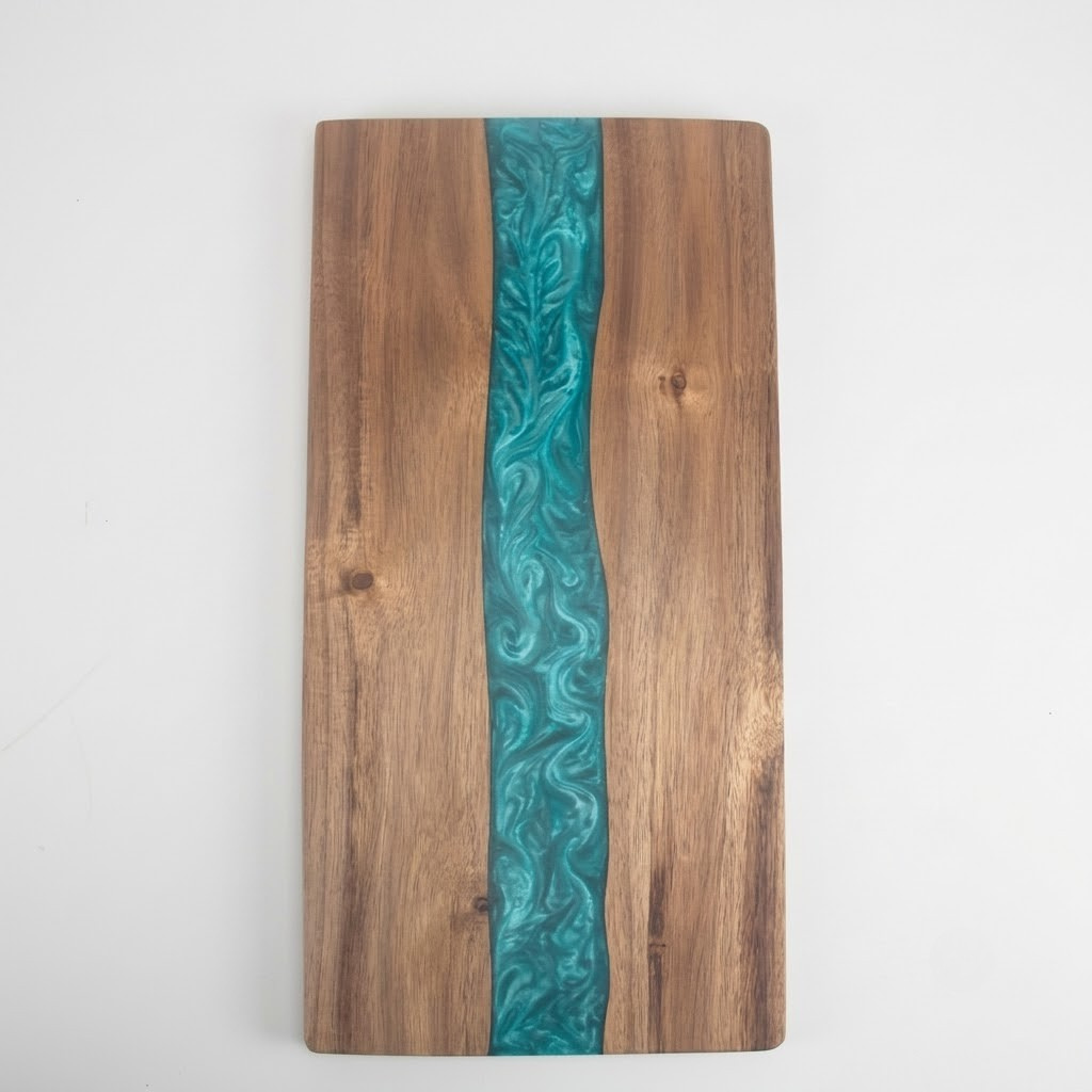 Two modern wall-mounted coat hooks in brushed gold with a black accent ring, shown on a clean white background.