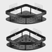 Two black corner bathroom shelves with slotted trays and clear wall-mounted suction cups, shown on a light gray background.