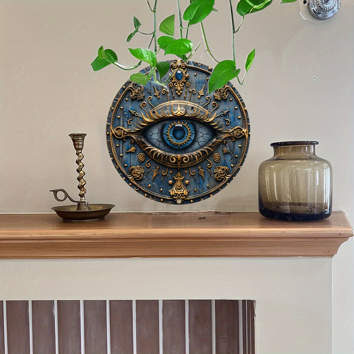 Decorative wall art with eye design on a wooden shelf with plants and a vase.