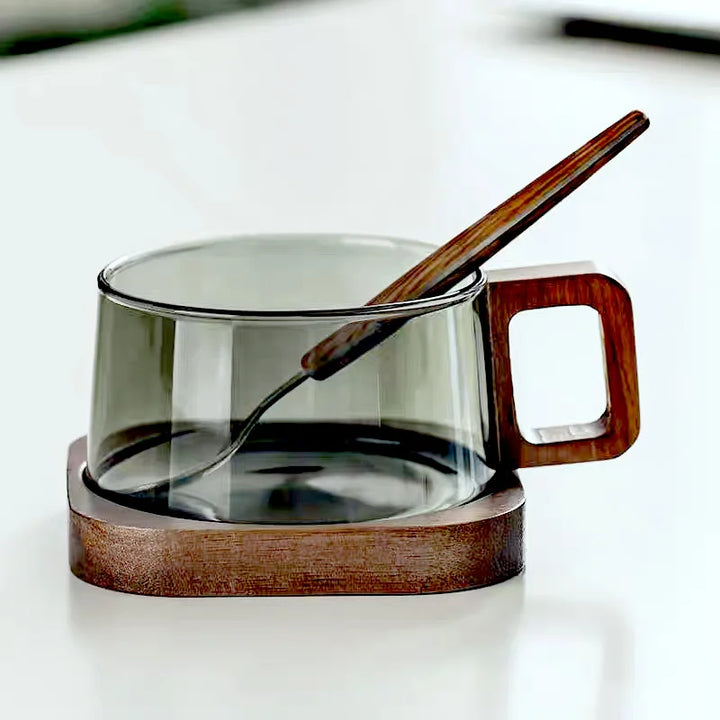 Glass container with wooden lid and handle on a white background