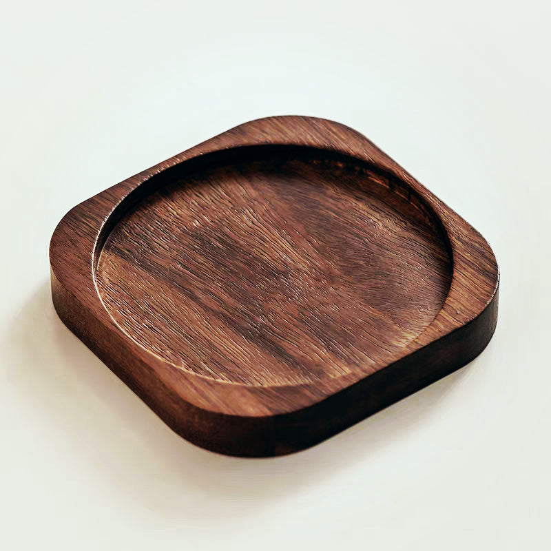 Wooden tray on a light beige background