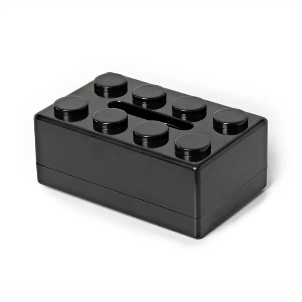 Black rectangular container with circular protrusions on a white background