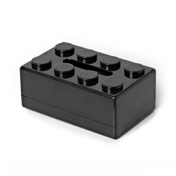 Black rectangular container with circular protrusions on a white background