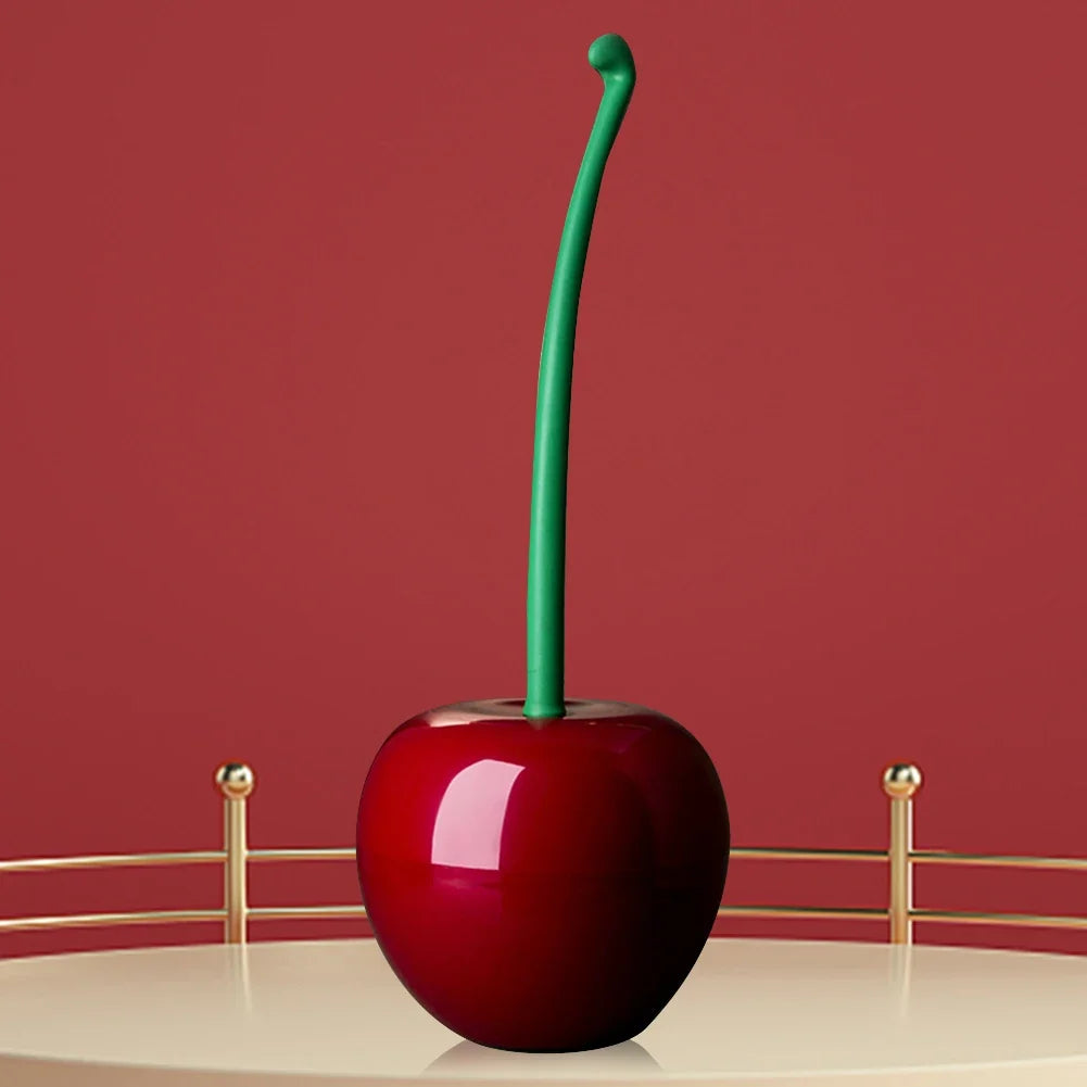 Red cherry with a green stem on a red background