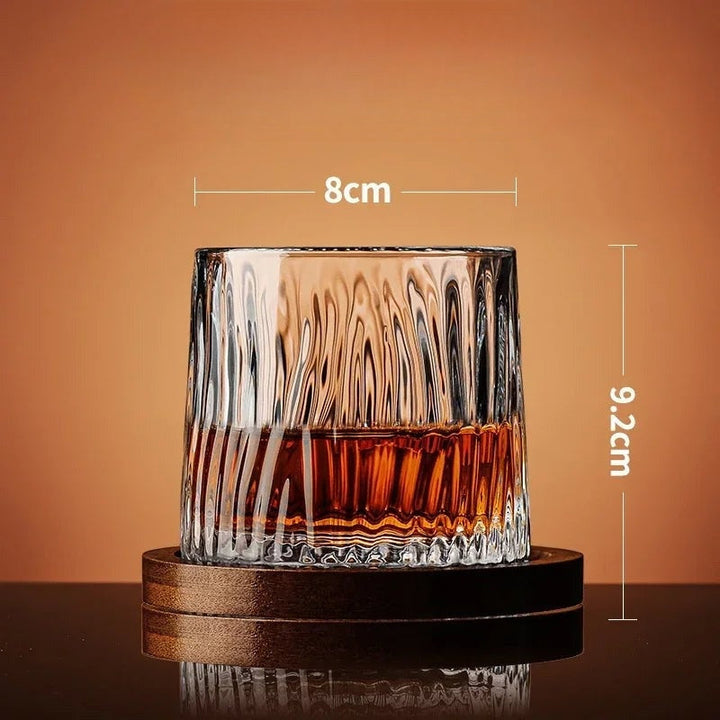 Glass tumbler with measurement details on a brown background