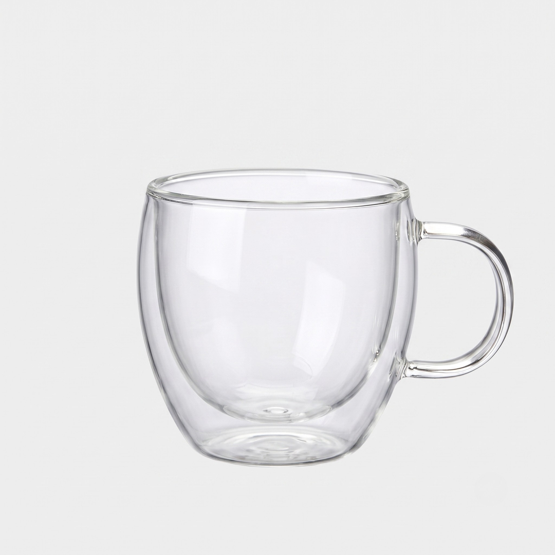 A clear double-walled glass mug with a curved handle, shown on a light gray background.