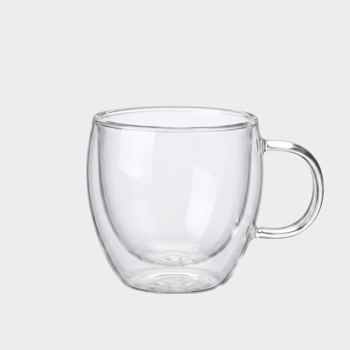 A clear double-walled glass mug with a curved handle, shown on a light gray background.
