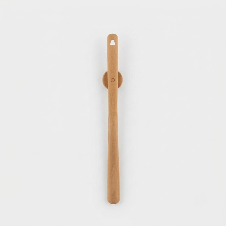 A light natural wood wall-mounted utensil holder with a single hanging handle, shown against a plain light gray background.