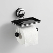 A wall-mounted toilet paper holder with a black tray and black toilet paper roll holder, shown holding a white toilet paper roll against a light gray wall.