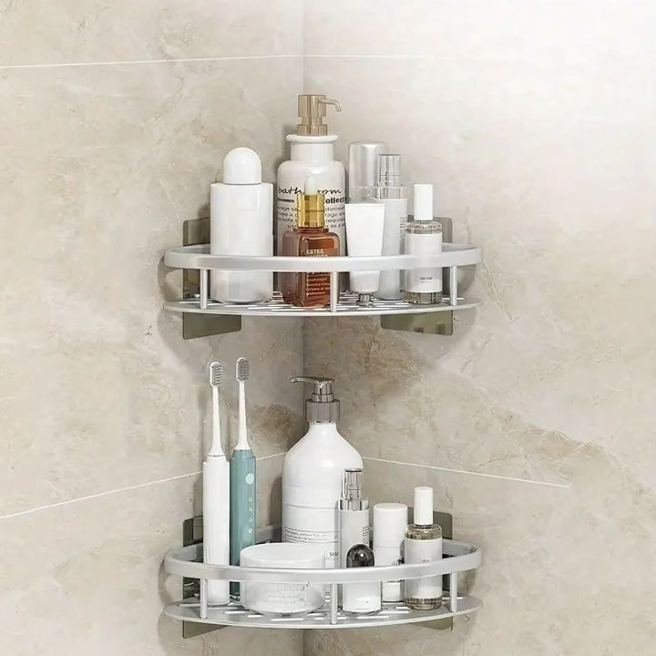 Corner shower caddy with various bottles and containers on a tiled wall background