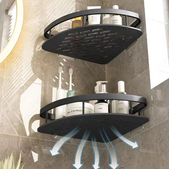 Black corner shower caddy with bottles on a tiled shower wall