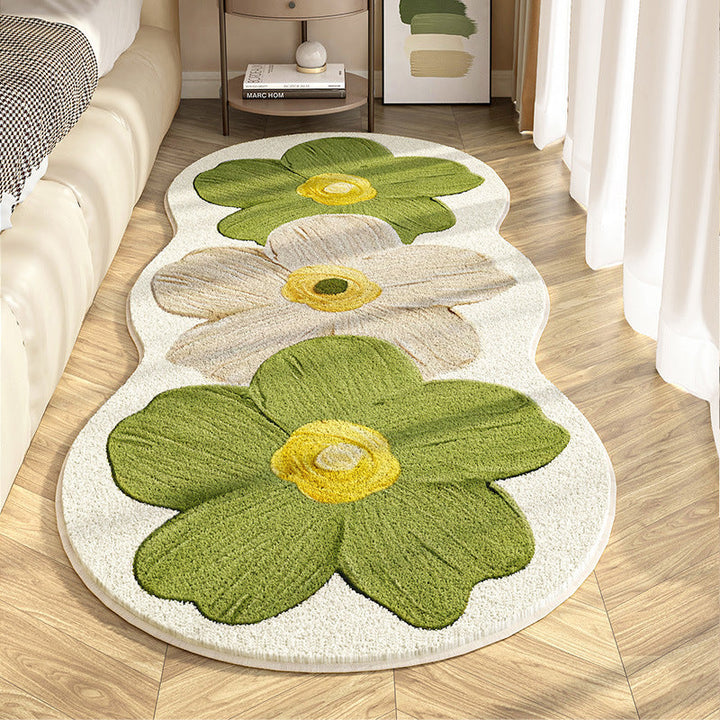 Floral-patterned rug on a wooden floor in a room setting
