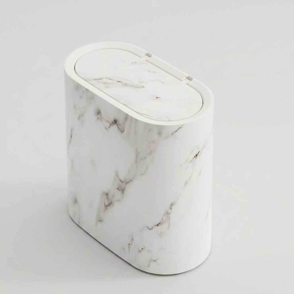 A modern oval-shaped trash can with a white marble pattern and a matching marble-look lid, shown on a clean light gray background.