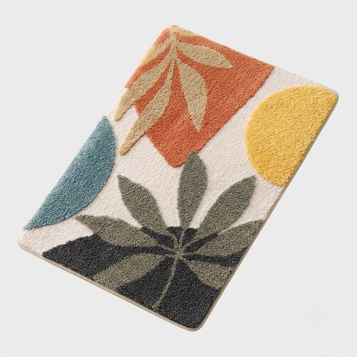 A rectangular textured rug with a retro abstract botanical pattern in terracotta, mustard yellow, teal, olive green, and charcoal gray on a cream background, shown at an angle on a light gray studio background.